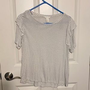 White and black polkadots with ruffles on shoulder